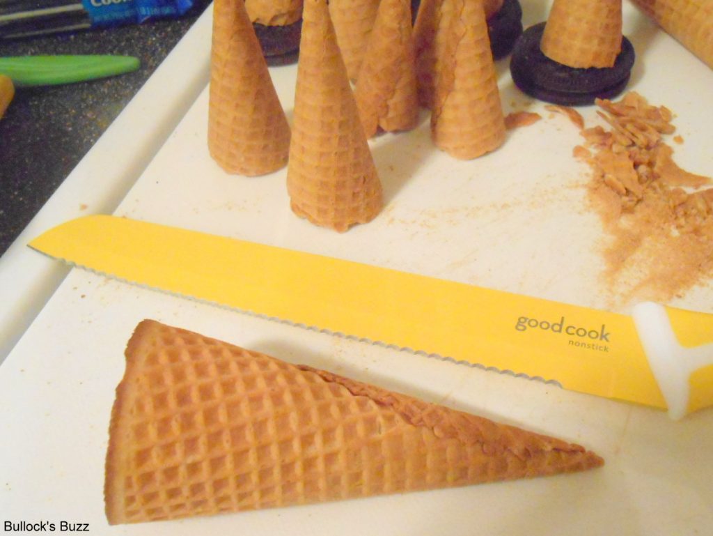 cut cones to make popcorn ball witches hats