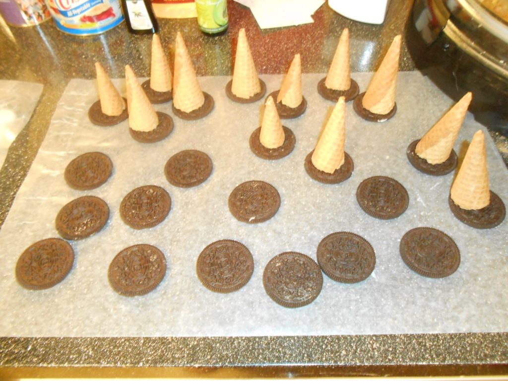add cones to wafer cookies to make hats