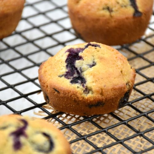 made from scratch blueberry muffins on cooling rack