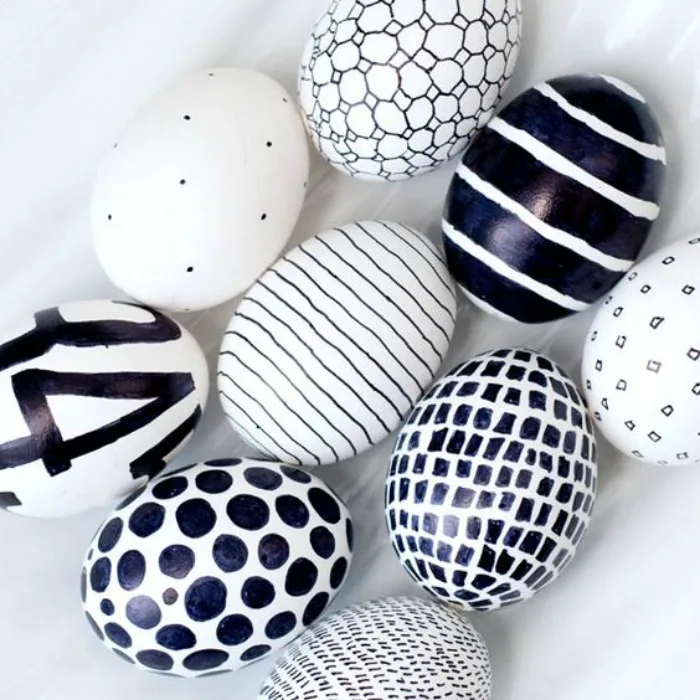 Decorate Easter eggs by coloring with a Sharpie marker