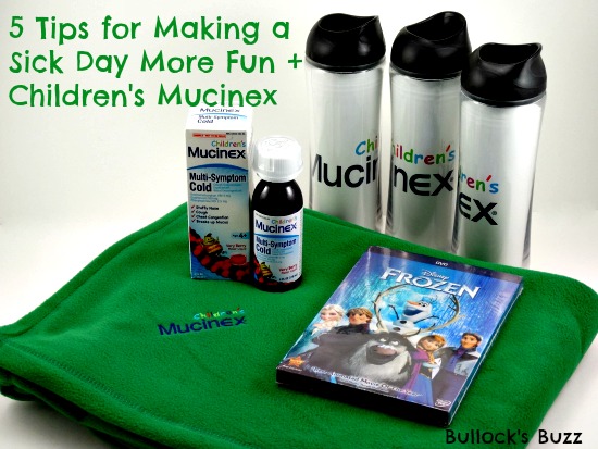 Children's Mucinex with a blanket, water bottles and a dvd