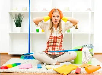 spring_cleaning_woman_sitting_in_floor