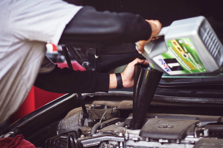 getting your car spring break ready by changing the oil