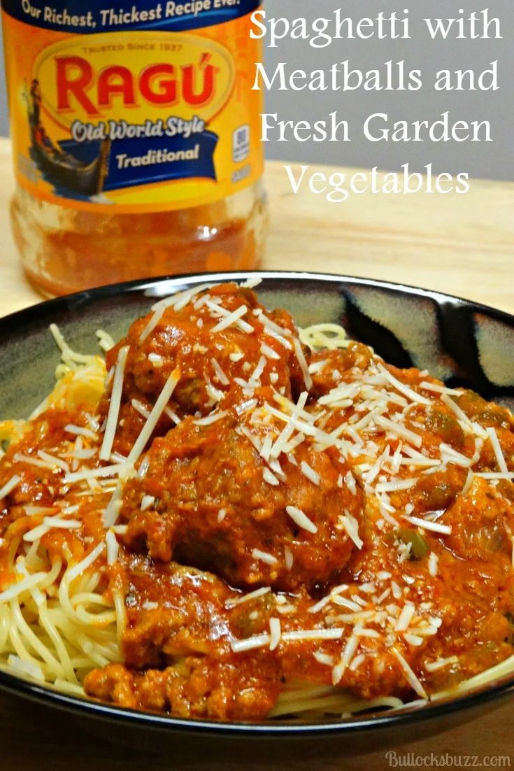 A classic spaghetti with meatballs recipe made with fresh garden veggies and topped with grated parmesan cheese.