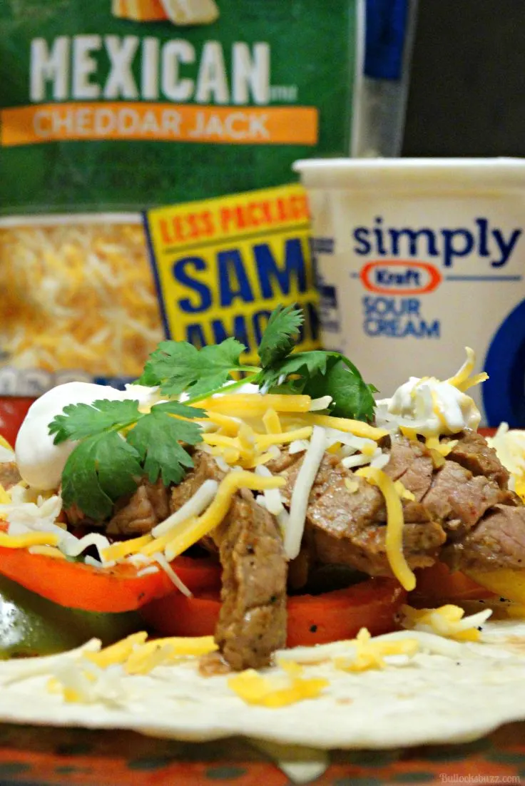 A grilled steak fajitas recipes made with juicy, tender steak and fresh vegetables both marinated in a tangy sauce, grilled to perfection, and wrapped into a warm fajita.