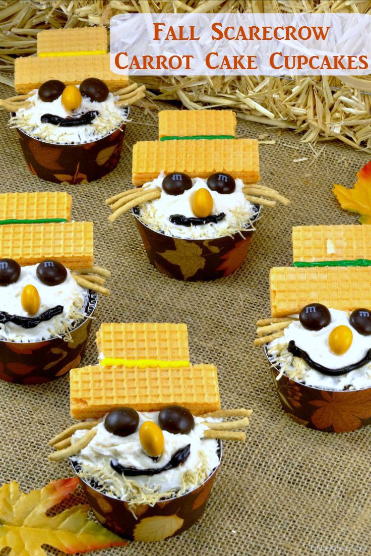 These Scarecrow Carrot Cake Cupcakes with Cream Cheese Frosting are too cute to scare away the crows, but they sure are fun to make and delicious to eat! Plus, free printable cupcake wrappers! #FallRecipes #recipes #carrotcake #carrotcakecupcakes
