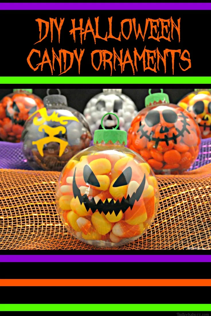 DIY Halloween candy ornaments laid out next to each other on orange and purple fabric.