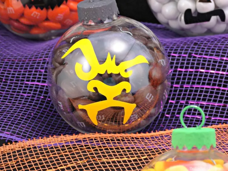 Werewolf DIY Halloween candy ornaments filled with brown M&MS candy,