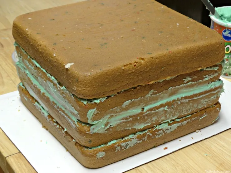 add last layer to the surprise inside cake