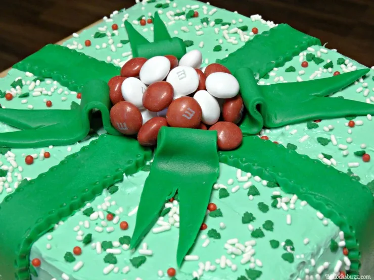 Peppermint M&M's form the actual bow for this gift box cake