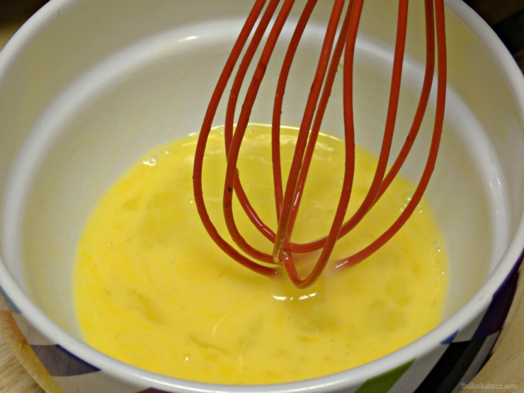 whisk an egg in a small bowl