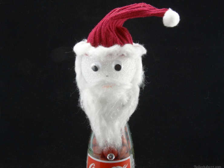 holiday craft santa claus bottle add facial features, beard and hat