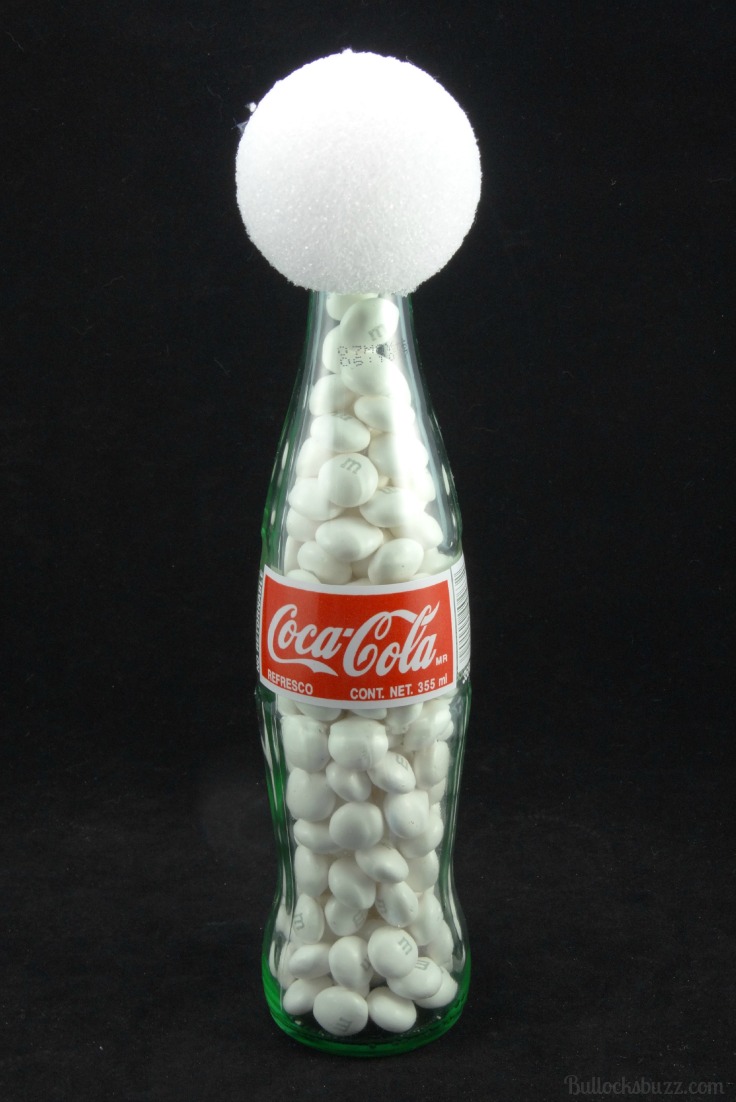 fill bottle with candies and attach the head to make Snowman DIY Coke Bottle Characters 