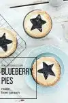 Bursting with fresh, juicy blueberries, and nestled in a buttery, flaky crust, these individual Mini Blueberry Pies have a delicious flavor. And with their star-shaped cutouts on top, they're the perfect dessert for any patriotic celebration, from Memorial Day to the 4th of July. #patrioticrecipes #memorialdayrecipe #minipies #blueberrypies