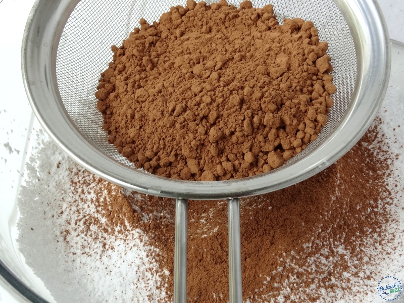 sift in the powdered cocoa