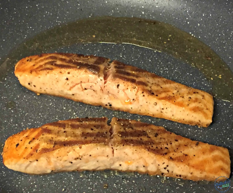 salmon picatta saute in sauce pan