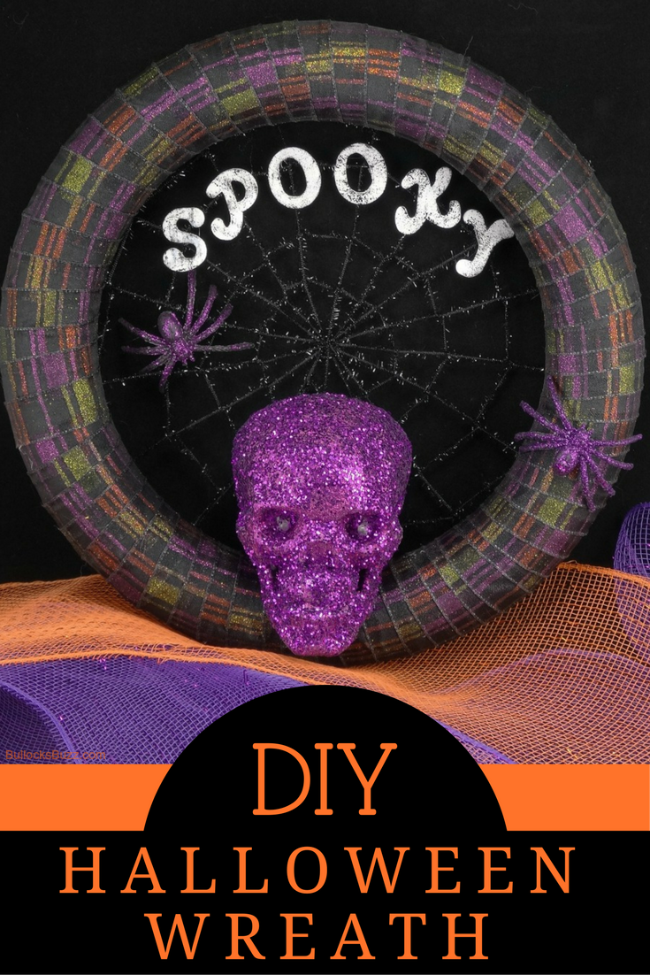 This spooky DIY Halloween Wreath is easy to make and inexpensive. It's the perfect addition to your Halloween decor.