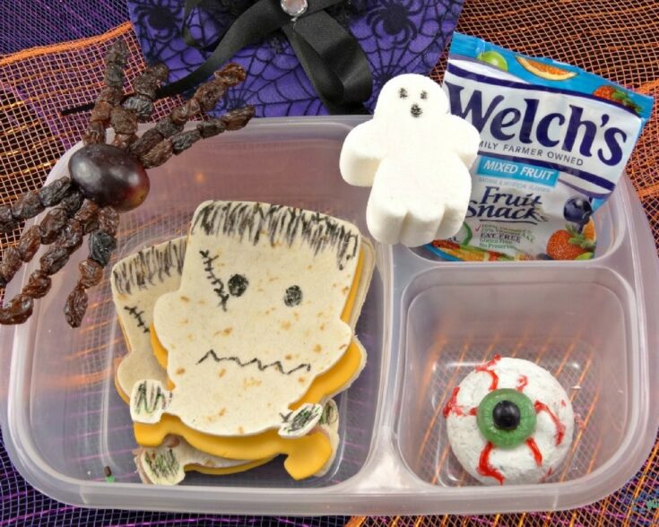 close up of Halloween lunch box on an orange and purple background