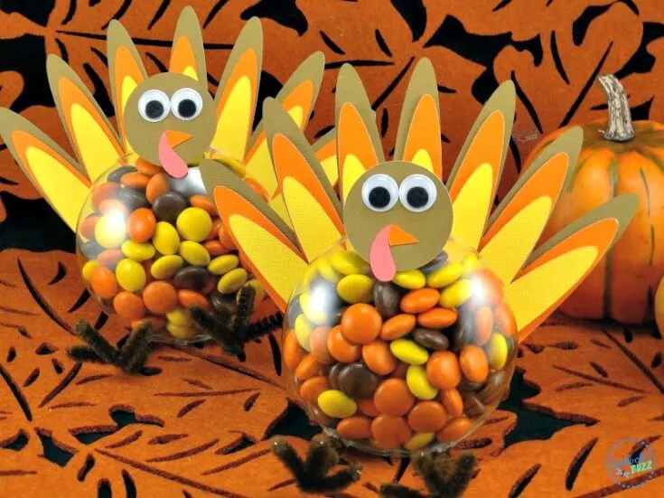 two DIY Thanksgiving turkey treats made from candy-filled ornaments