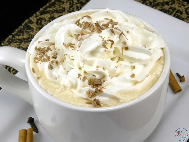 winter spiced coffee with whipped cream and chocolate shavings