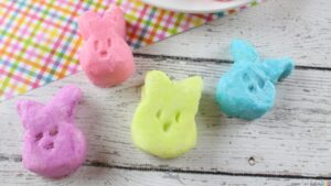 close up of four pastel-colored Cream Cheese Mints for Easter shaped like bunnies