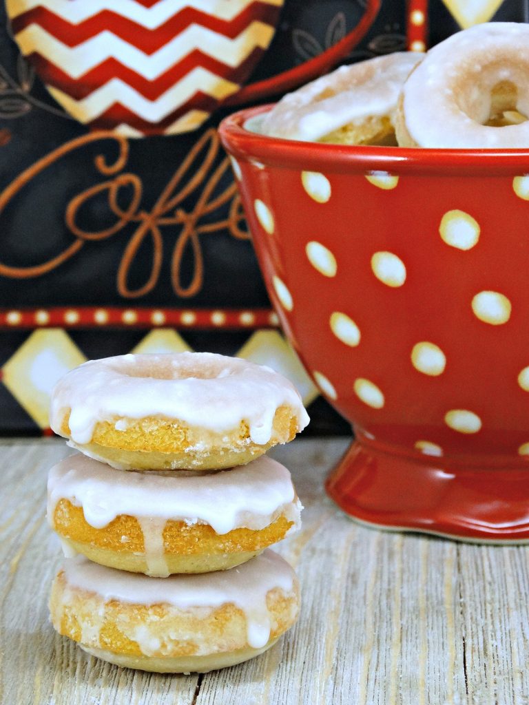 These soft and delicious Mini Baked Donuts with Caramel Glaze are the perfect compliment to your morning coffee and are sure to brighten up your day!