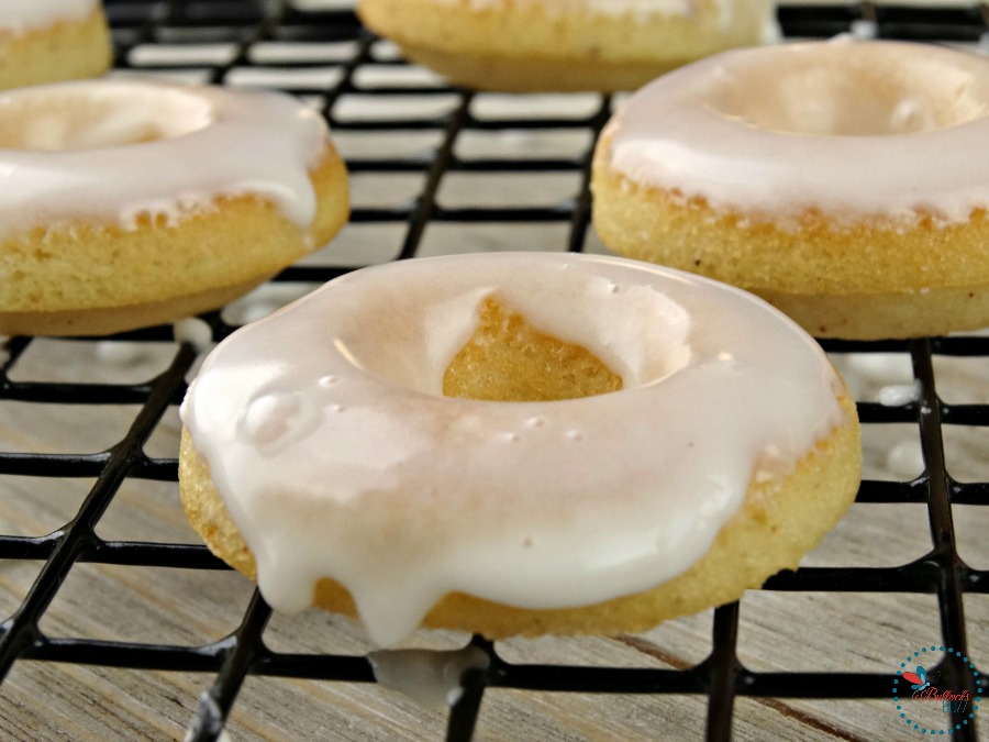 Mini Baked Donuts with Caramel Glaze placed on rack to cool