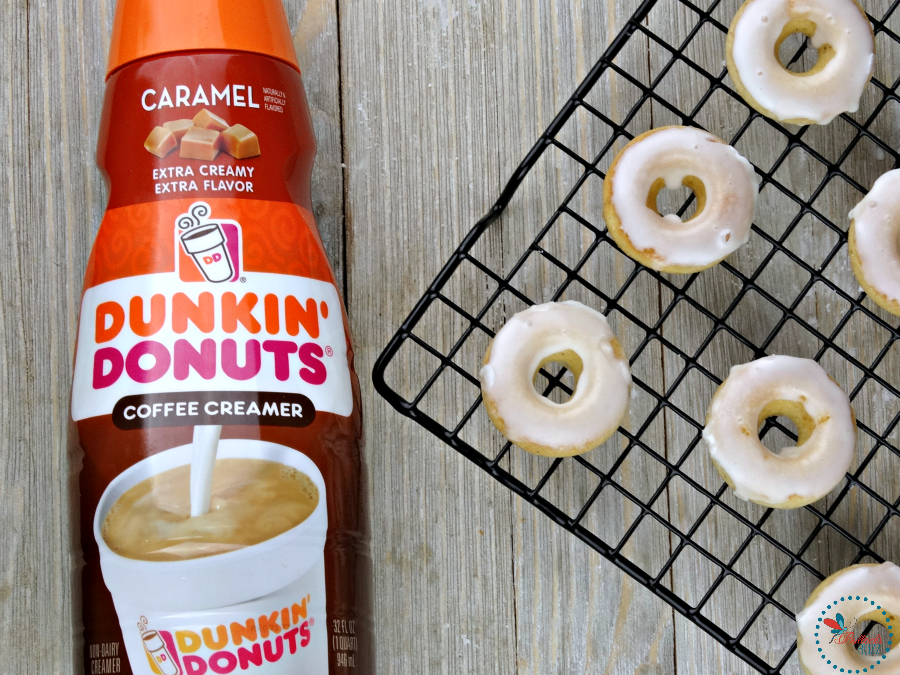 Mini Baked Donuts with Caramel Glaze on cooling rack with a bottle of  Dunkin' Donuts Caramel creamer