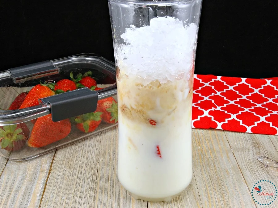 Strawberry Vanilla Smoothie add all ingredients to blender