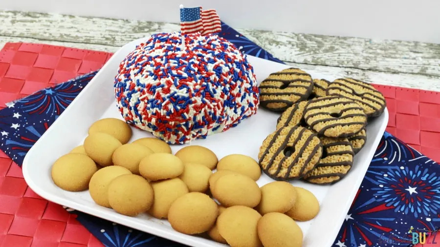 easy Patriotic Funfetti Cake Cheese Ball on plate with cookies