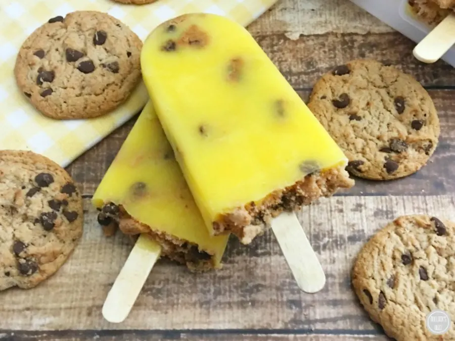 These cool, creamy and sweet French Vanilla Pudding Pops are perfect for Spring, and will satisfy any sweet craving with pieces of real chocolate chip cookies! More frozen recipes in addition to S'mores Pudding Pops