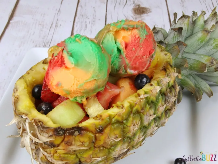 Pineapple Boat Fruit Salad add scoops of sherbet and enjoy
