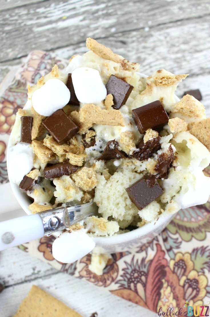 Packed with the summery flavors of chocolate, marshmallows and graham cracker crumbs, you can enjoy the classic flavor of of s'mores in less than five minutes with this delectable ooey, gooey microwavable S'mores Mug Cake recipe! No campfire needed.
