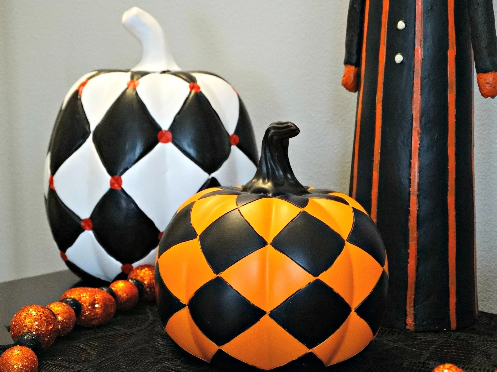 Halloween tablescape Haunted Harlequin checkered pumpkins