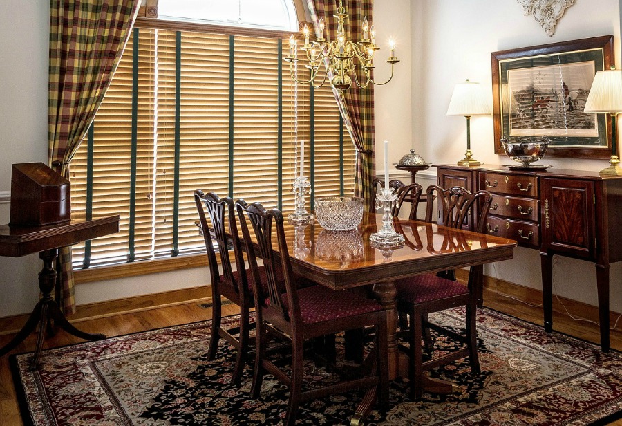 area rugs under a dining room table can pull the entire room together