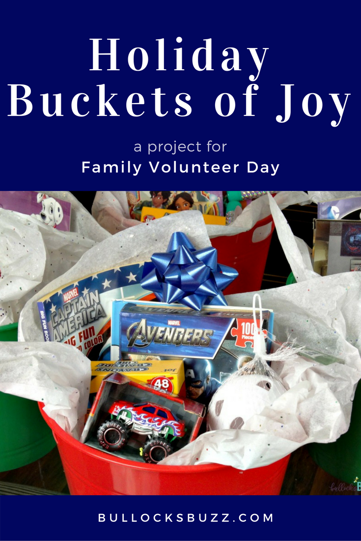 These simple DIY Holiday Buckets of Joy are a fun and easy way to give back as a family on Family Volunteer Day!