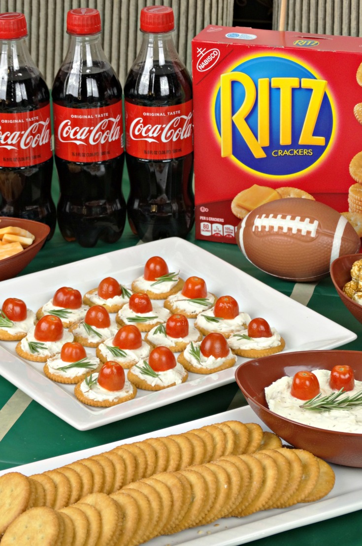 You'll score big with these delectable Rosemary, Tomato & Herbed Cream Cheese Bites! Quick and easy-to-make, this game day recipe is perfect for your next party!