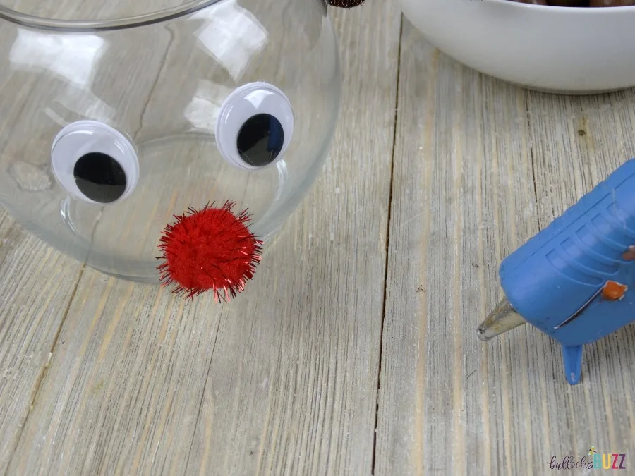 DIY Rudolph Christmas Candy Jar glue on eyes and nose