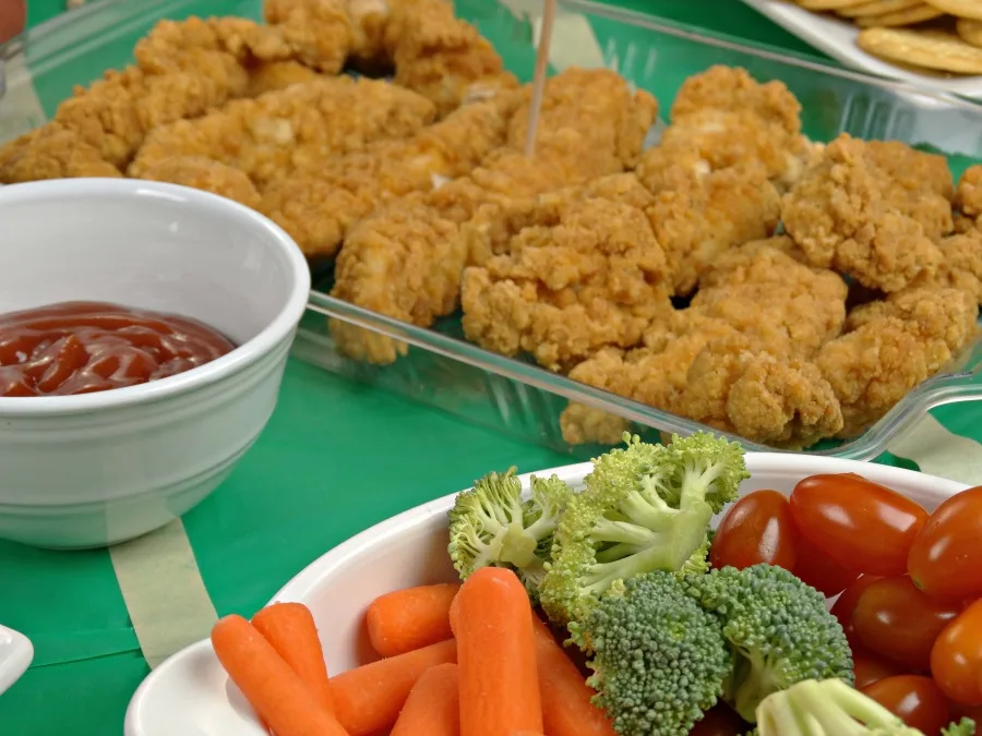tabletop tailgating appetizers chicken fingers and fresh veggies