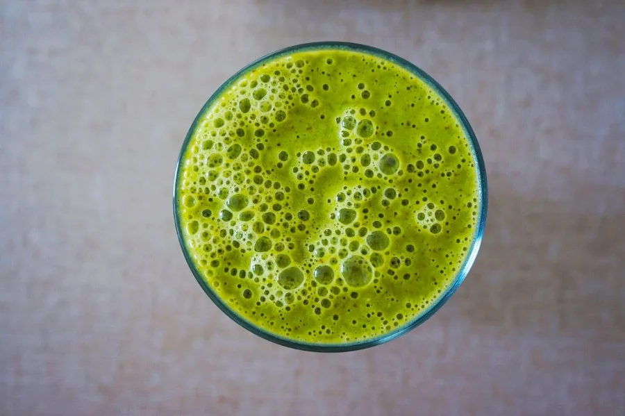 An overhead picture of a green smoothie, one of the 3 Simple Recipes to Help Keep You Healthy This Flu Season