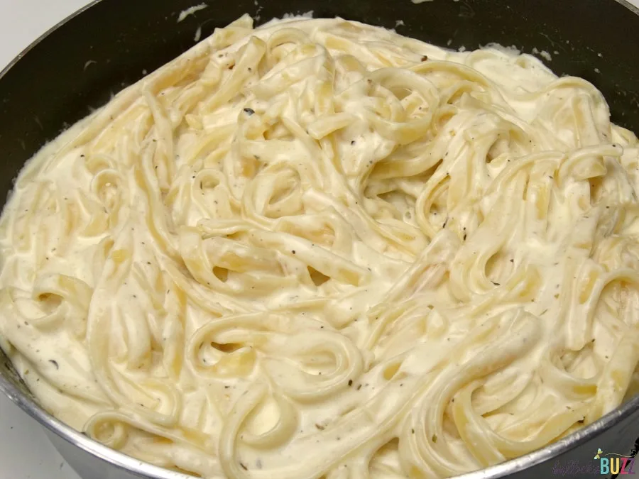 Add the noodles to make the Chicken Fettuccine Alfredo with Homemade Alfredo Sauce