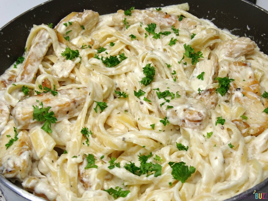 Top the Chicken Fettuccine Alfredo with Homemade Alfredo Sauce with parsley