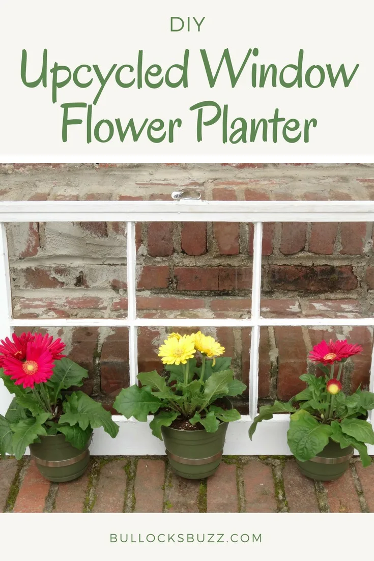 Turn an old window into a gorgeous window flower planter with this fun tutorial for a DIY Upcycled Window Flower Planter. This simple flower planter not only looks amazing, it's incredibly easy to make. #DIY #gardening