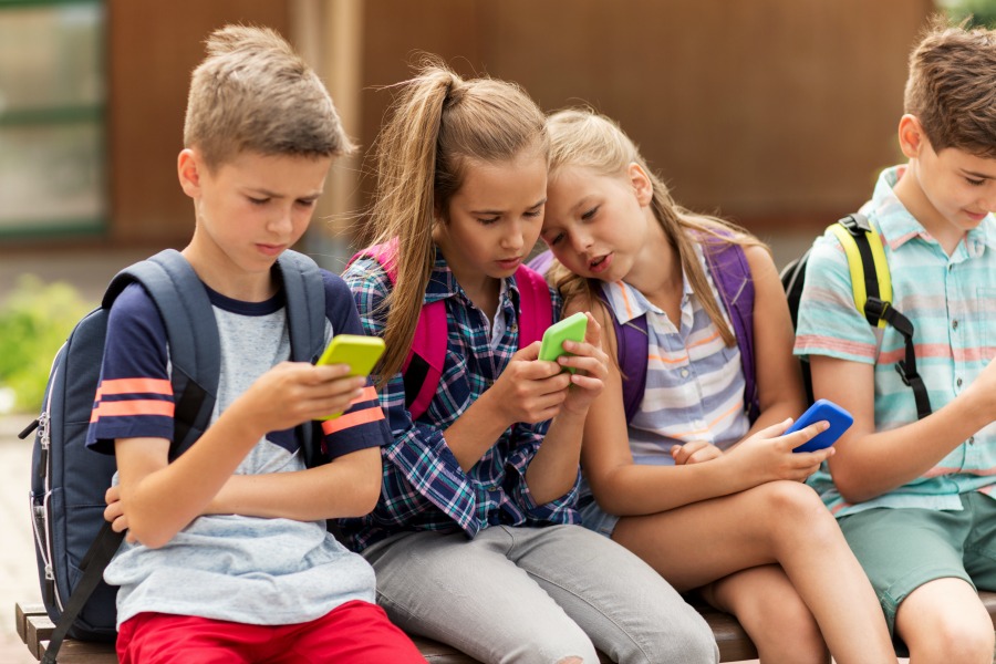 internet safety for kids kids using smartphones at school