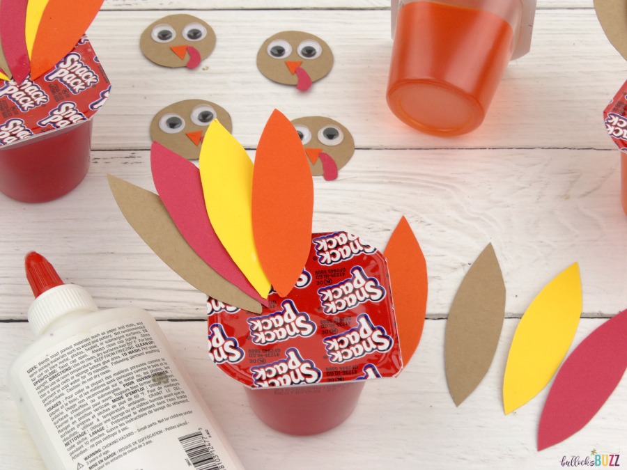 glue Jello Pack Thanksgiving Turkey Treats feathers to the lids of jello packs