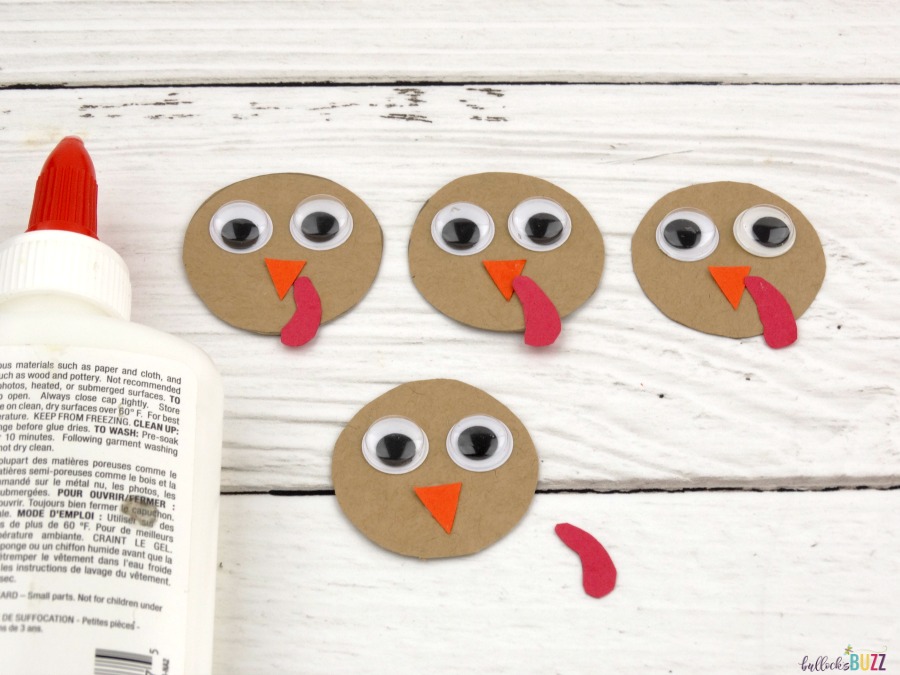 use glue to attach eyes beaks and snood to heads of Jello Pack Thanksgiving Turkey Treats