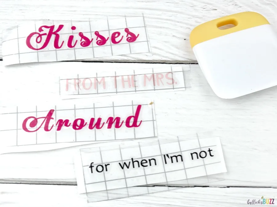 use transfer tape to apply vinyl to Kisses From the Mrs DIY Valentine's Day Mug 