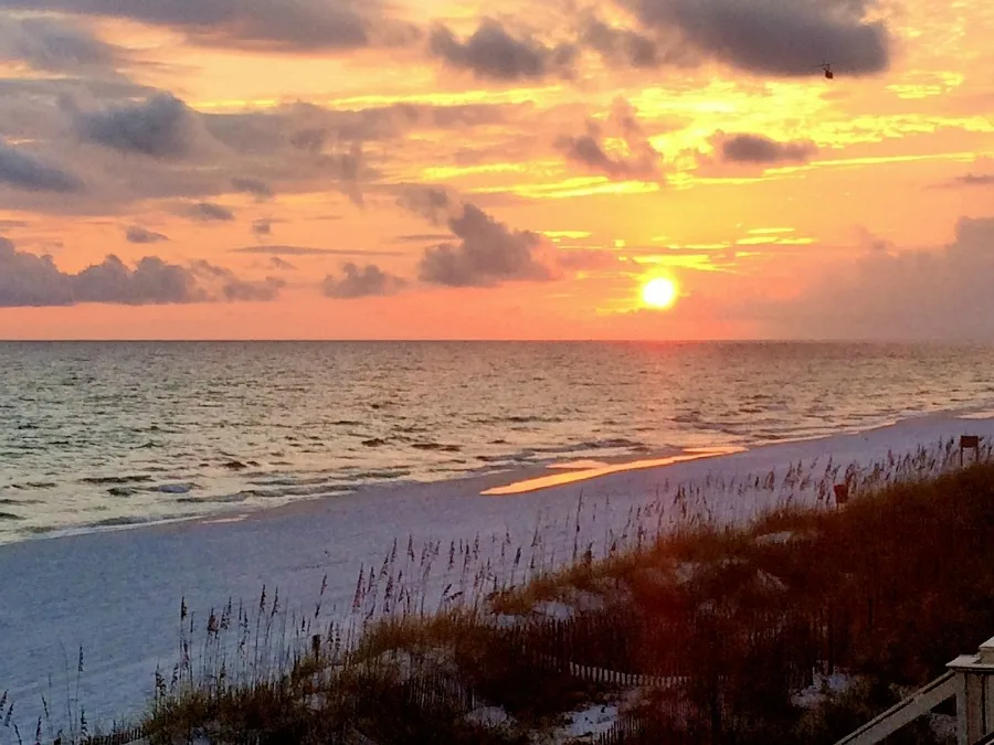 easy Money-Saving Vacation Tips beach sunset