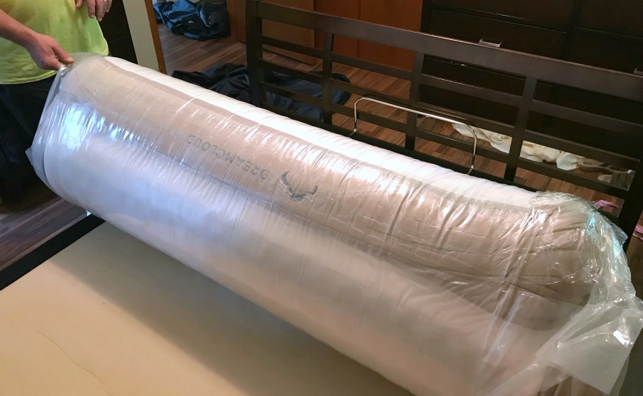 dreamcloud mattress review opening and unrolling