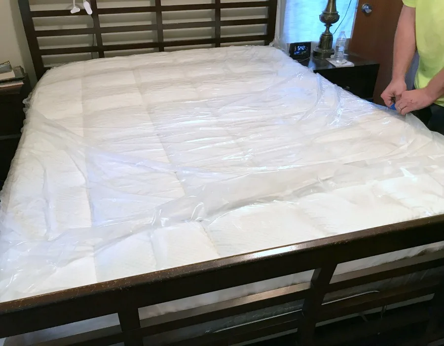 dreamcloud mattress unrolled removing plastic